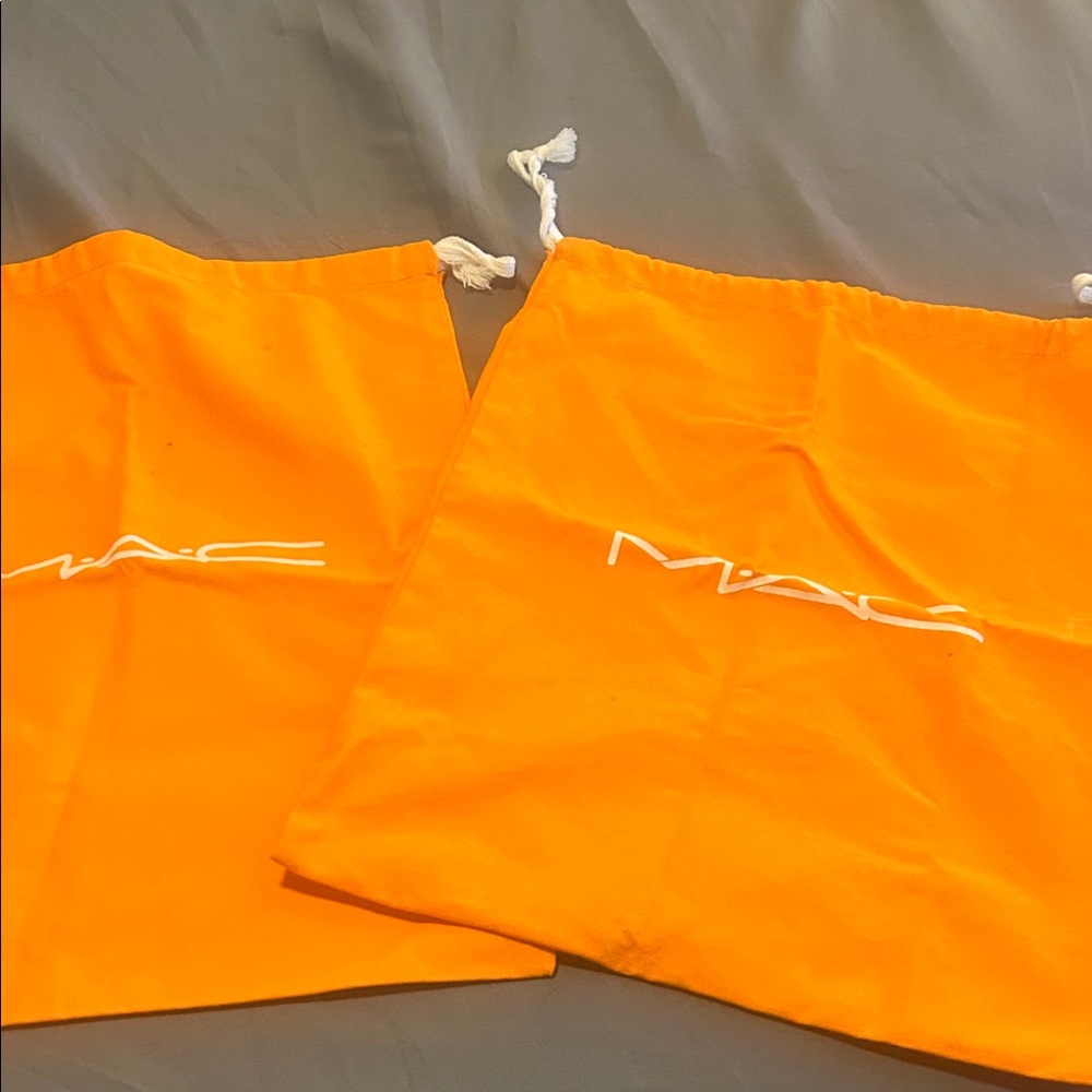 2 MAC Orange Drawstring Bags